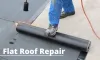Roofing Services — Repairing of a Flat Roof in Grand Haven, MI