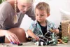 Babysitter on demand app: Professional hands taking care of your child