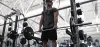 Target your trapezius by performing the barbell shrugs daily
