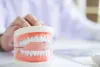 How to Stop Food from Sticking to Dentures?