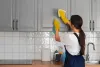 medium-shot-woman-cleaning-home_11zon.jpg