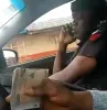 Police man caught on video collecting bribe from a motorist, arrested