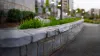 How can you preserve the plants by installing retaining walls in Burnaby?