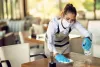 waitress-cleaning-tables-with-disinfectant-wearing-protective-face-mask-cafe_11zon.jpg