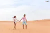 young-man-woman-walking-in-desert-couple-girl-and-2024-09-22-11-01-29-utc-scaled.jpg
