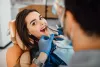 young-female-patient-visiting-dentist-office_3.jpg