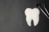 dentist-tools-mirror-teeth-made-sugar-black-background-1-1536x1024.jpg