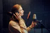 female-singer-sings-a-song-recording-studio-1024x672.jpg